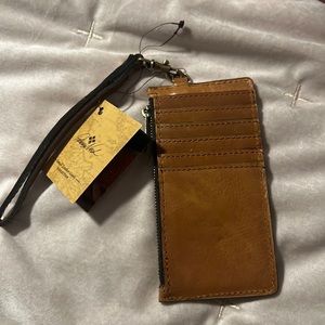 Patricia Nash distressed Leather credit card wristlet in color biscuit